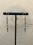 Gold wire with teal and black, white, red and yellow beads. Simple stick earrings 18 kt gold 