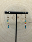 Gold wire with teal and black, white, red and yellow beads. Simple stick earrings 18 kt gold 