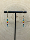 Gold wire with teal and black, white, red and yellow beads. Simple stick earrings 18 kt gold 