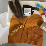 Moccasin kits include the following  - Pattern  - Liner  - Hide Vamp, Sole and Welts  -Strip of Beaver Fur  - Beading thread  - Sinew  - Glover, Beading and Plain Needles  - 2 pieces of Beading Foundation  - 2 index Cards  - 10 small bags of seed beads